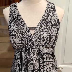 OLEG CASSINI. Black and white floral maxi dress with silver strands all …